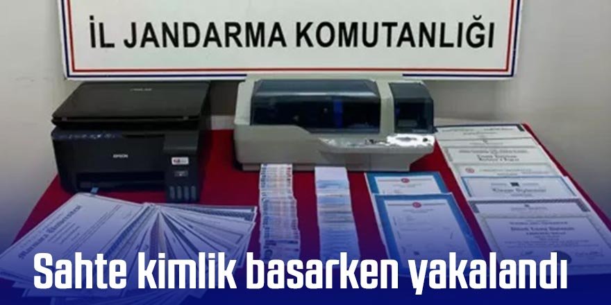 Sahte kimlik basarken yakalandı