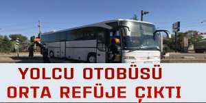 YOLCU OTOBÜSÜ ORTA REFÜJE ÇIKTI