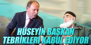 HÜSEYİN BAŞKAN TEBRİKLERİ KABUL EDİYOR