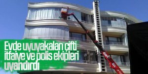 Evde uyuyakalan çifti itfaiye ve polis ekipleri uyandırdı