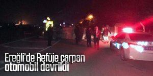 Refüje çarpan otomobil devrildi