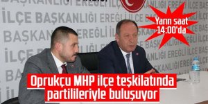 OPRUKÇU MHP'DE...