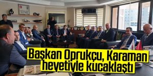 Başkan Oprukçu Karaman heyetiyle kucaklaştı