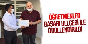 ÖĞRETMENLER BAŞARI BELGESİ İLE ÖDÜLLENDİRİLDİ