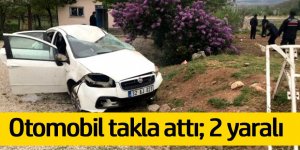 Otomobil takla attı, motoru fırladı: 2 yaralı