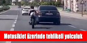 Motosiklet üzerinde tehlikeli yolculuk