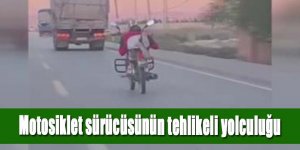 MOTOSİKLET SÜRÜCÜSÜNÜN TEHLİKELİ YOLCULUĞU KAMERADA