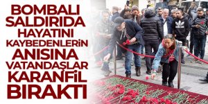 Beyoğlu'ndaki bombalı saldırıda hayatını kaybedenler anısına vatandaşlar karanfil bıraktı