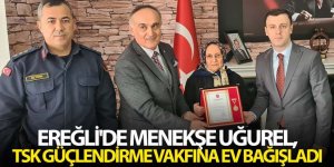 Ereğli'de Menekşe Uğurel, TSK Güçlendirme Vakfına ev bağışladı