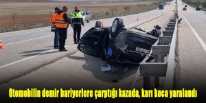 Otomobilin demir bariyerlere çarptığı kazada, karı koca yaralandı