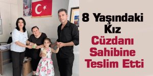 8 Yaşındaki Kız Cüzdanı Sahibine Teslim Etti