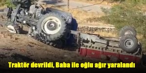 Traktör devrildi, Baba ile oğlu ağır yaralandı