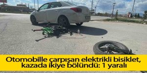 Otomobille çarpışan elektrikli bisiklet kazada ikiye bölündü: 1 yaralı