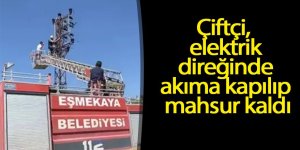 Çiftçi, elektrik direğinde akıma kapılıp mahsur kaldı